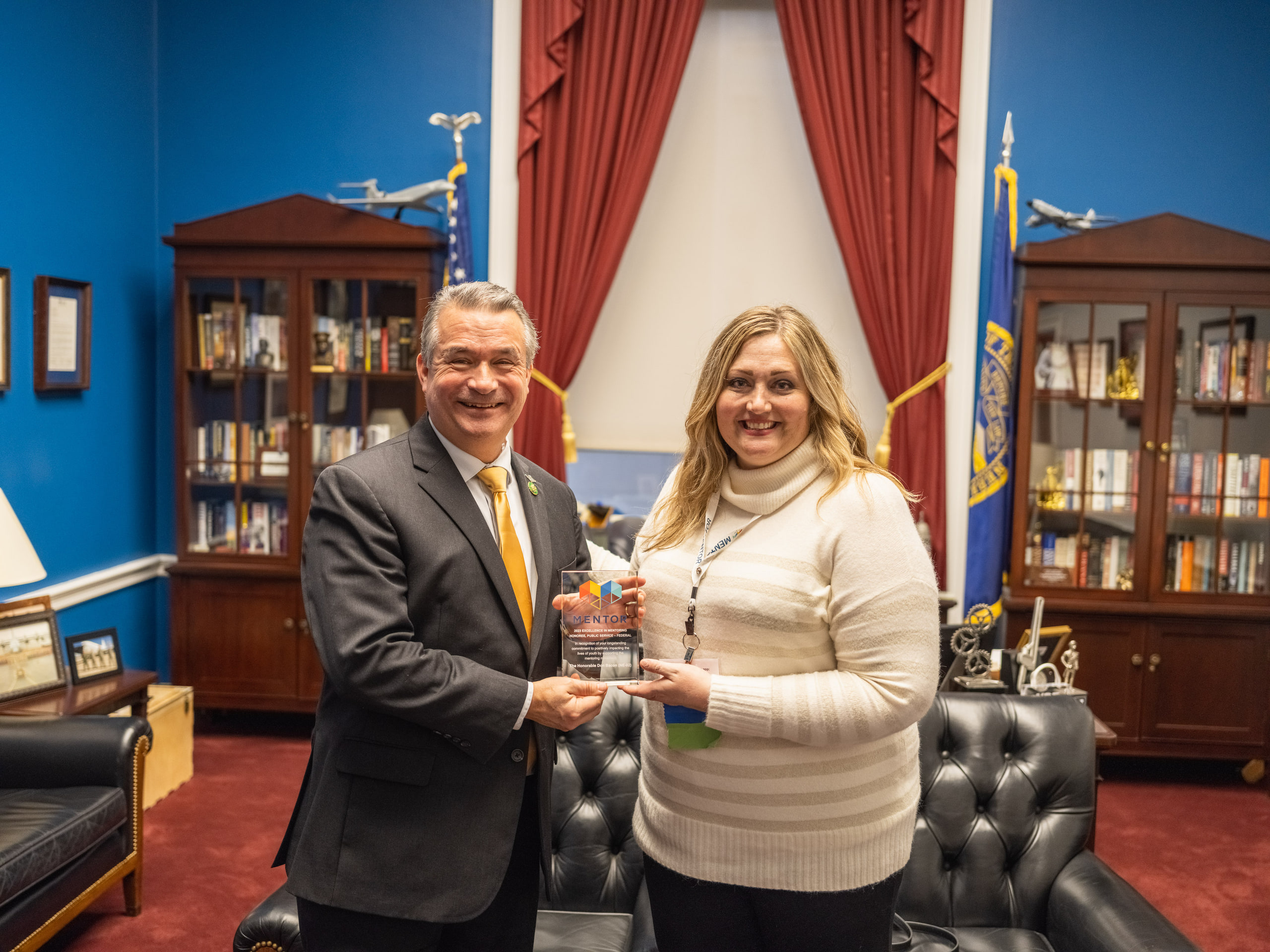 Award handshake, congressional office.