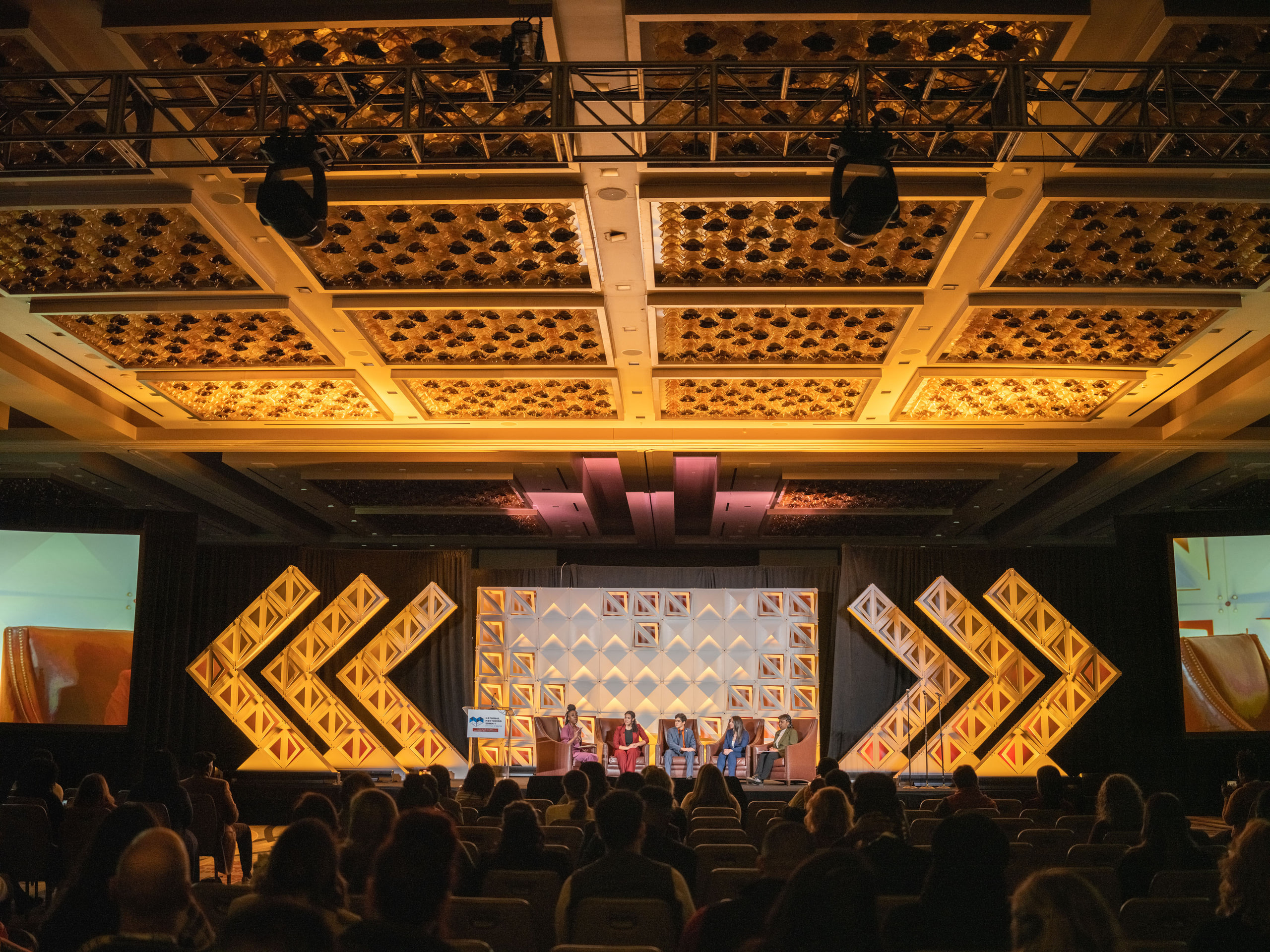 Theater wide, gold chevrons, room as subject.