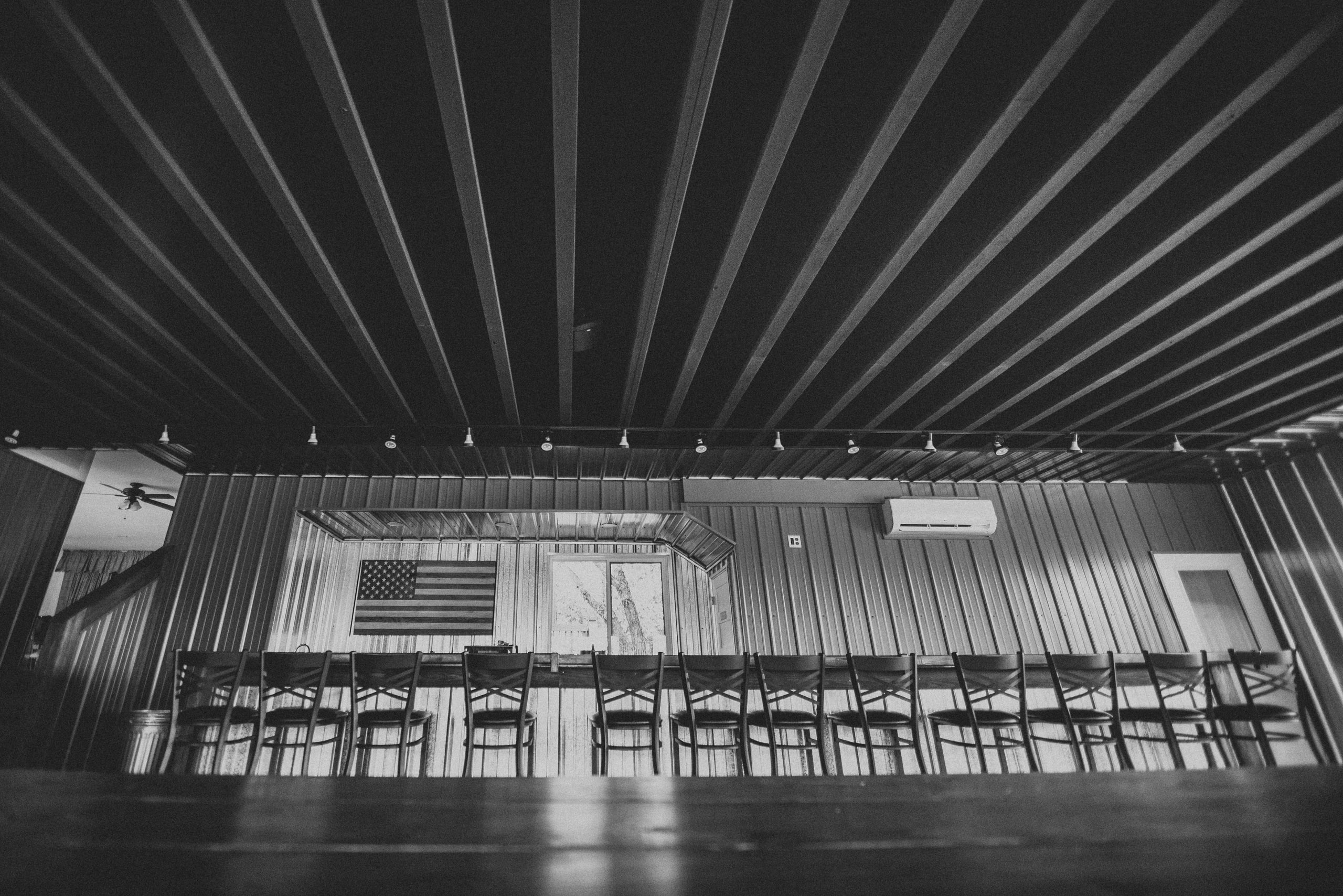 B&w ribbed ceiling, structure as subject.