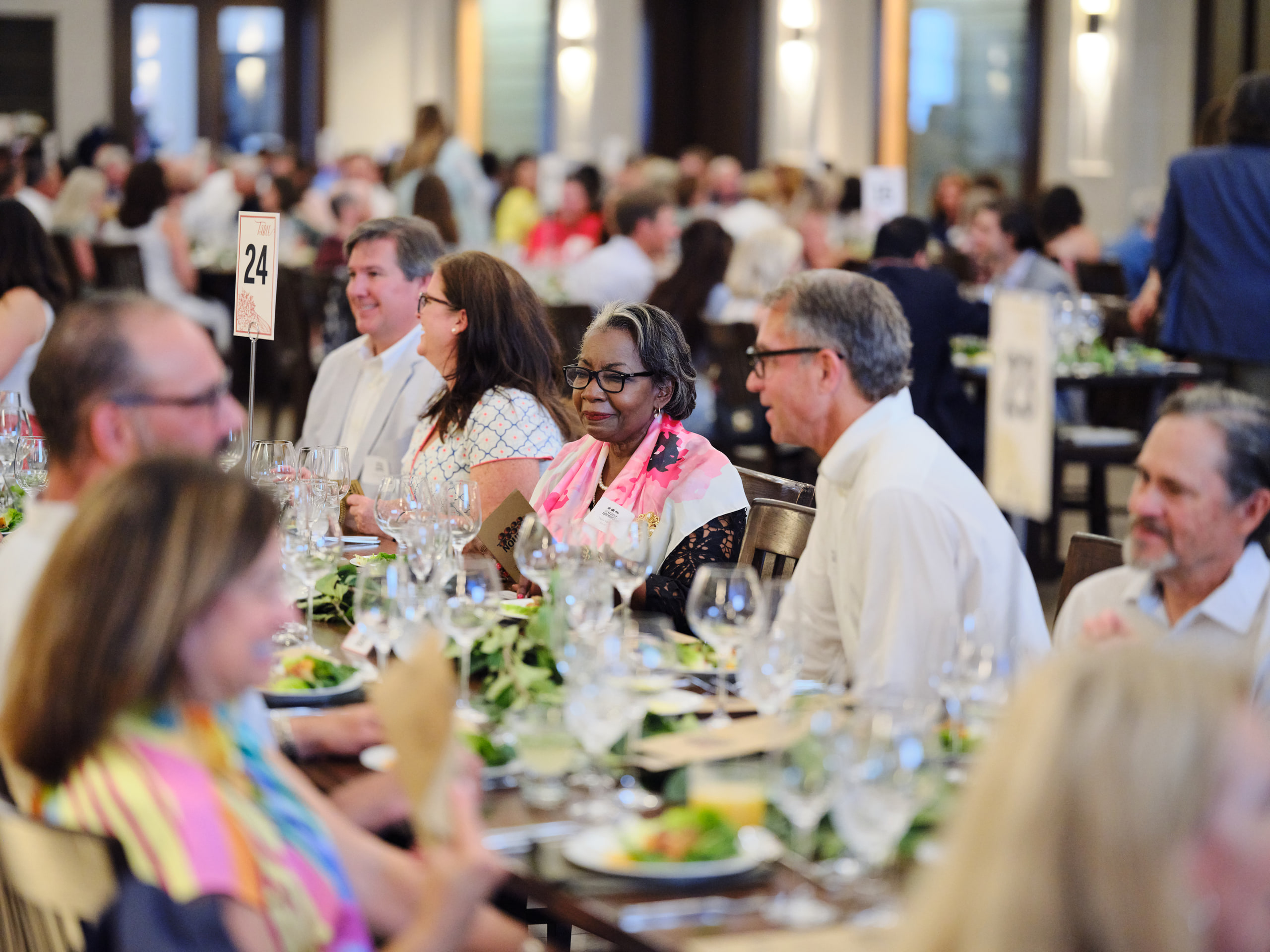 Long tables, guests, depth.
