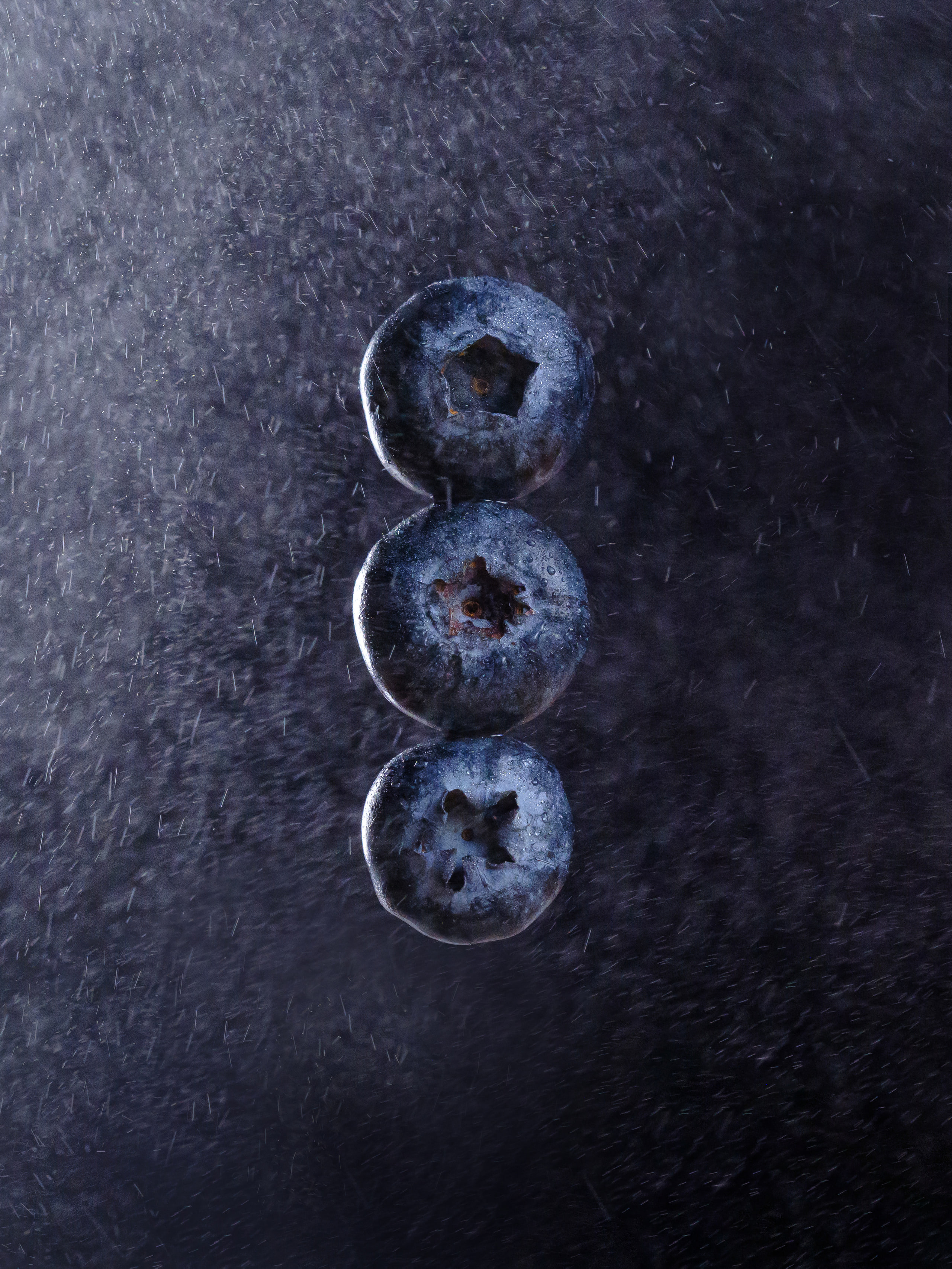 Three discs on dark, almost abstract, still legible.