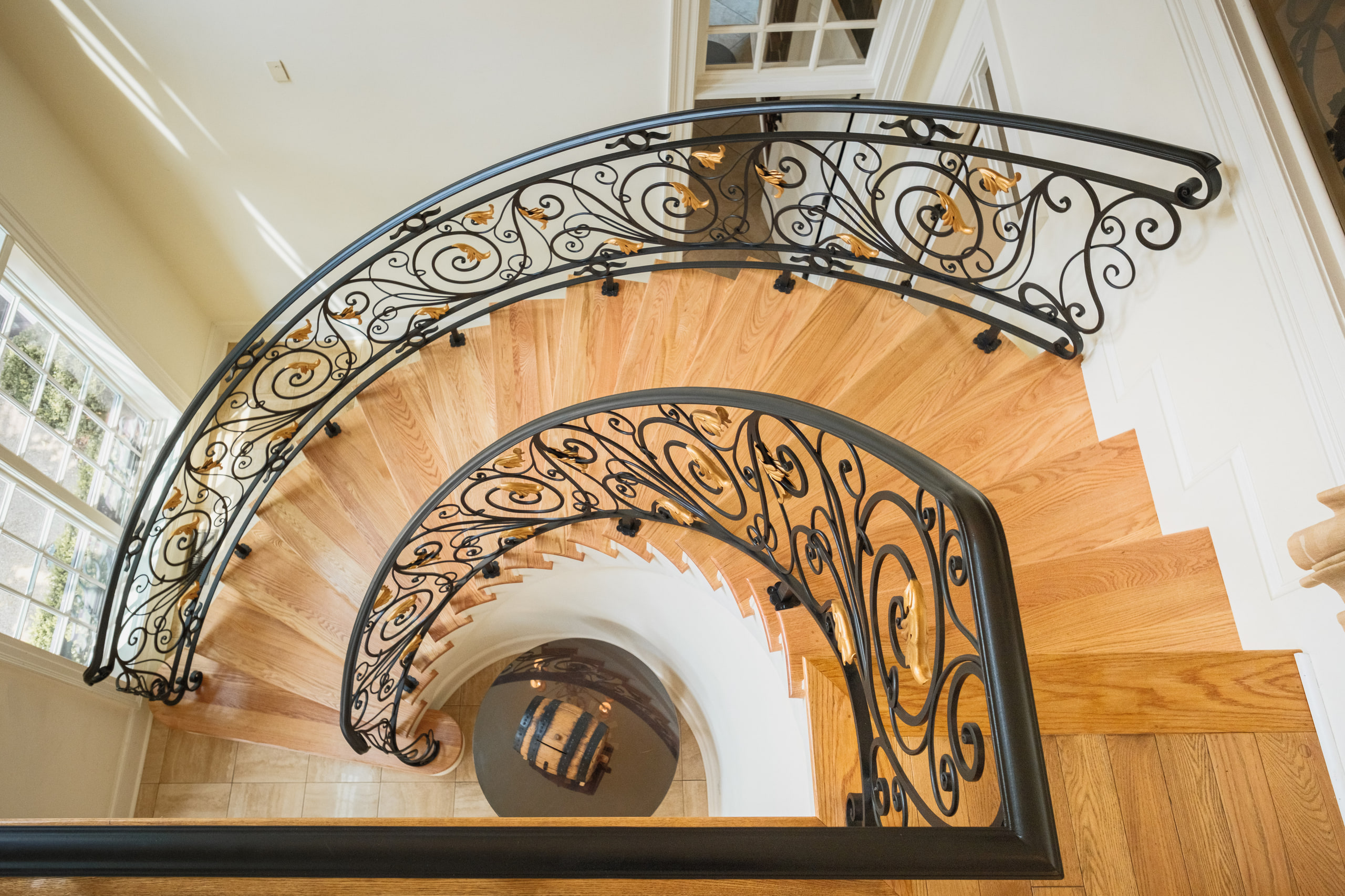 Stair from above, spiral reads as pure line.