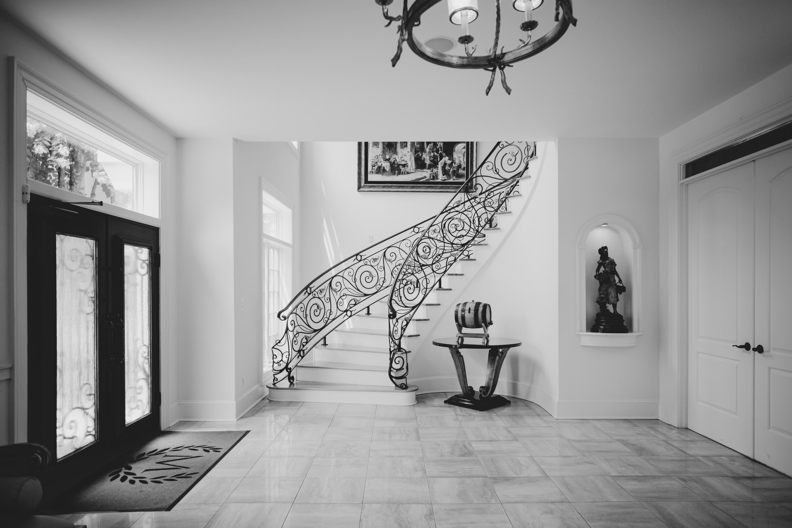 White gallery and the stair beyond.