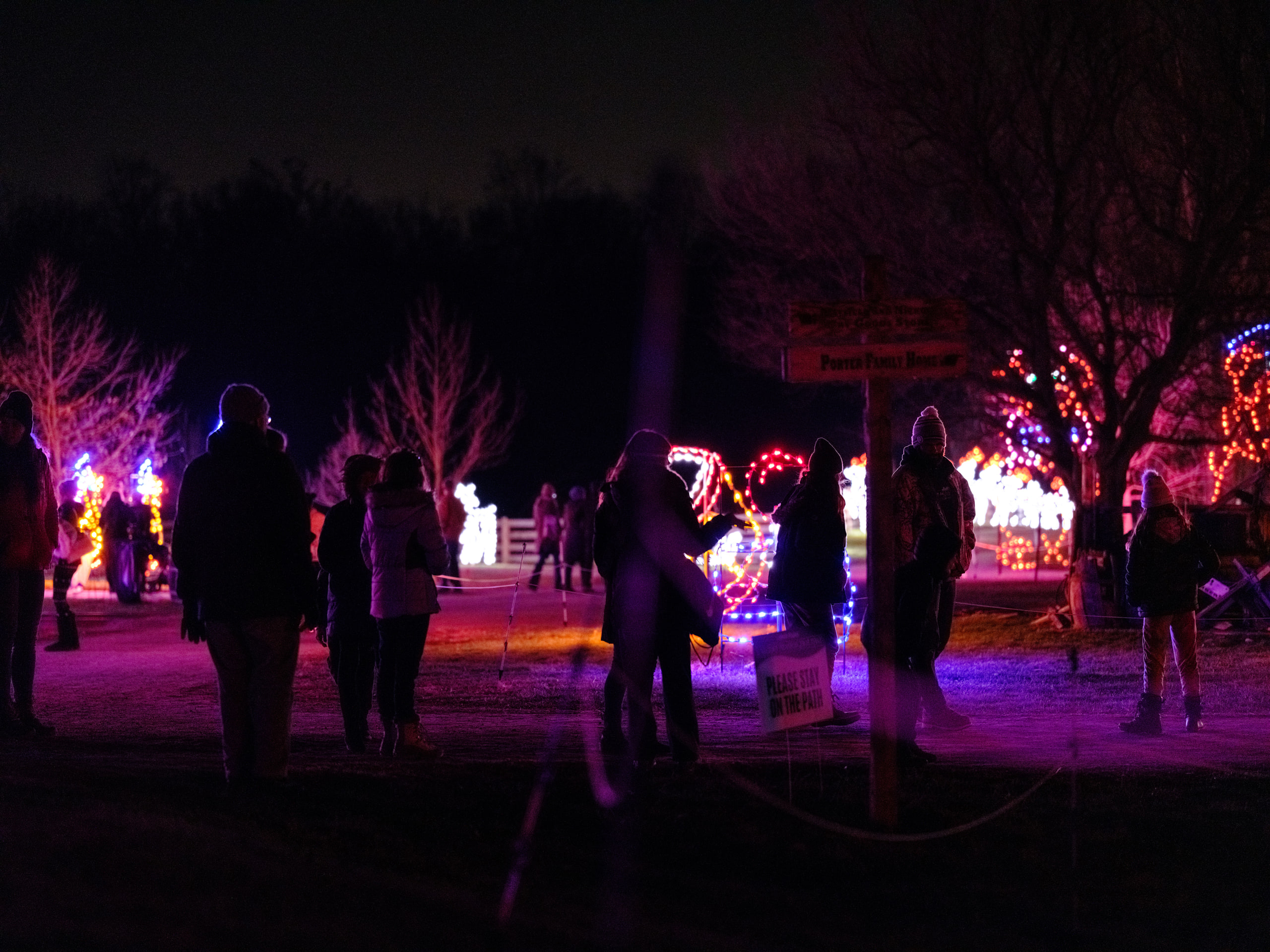Crowd among the light installations.