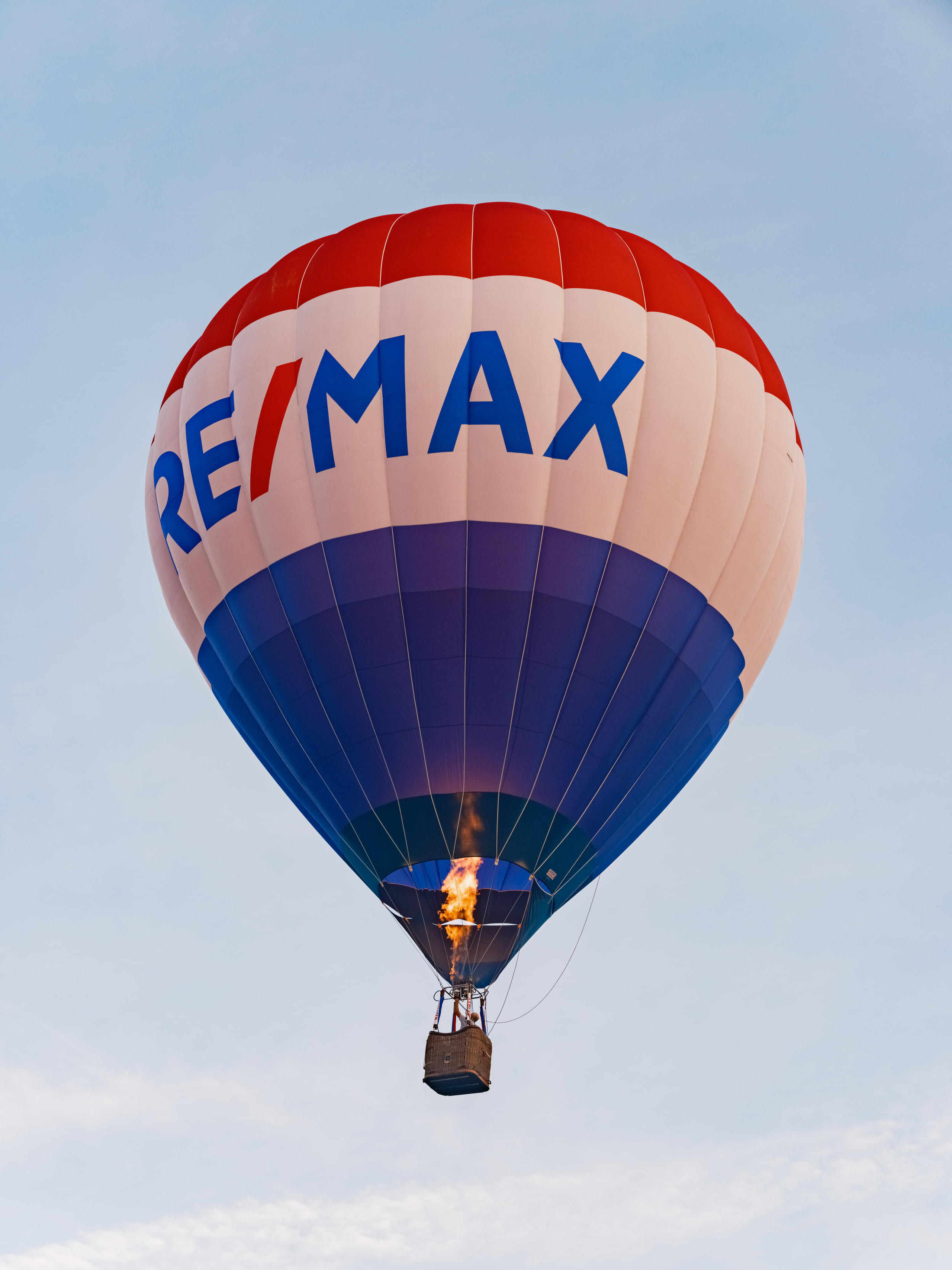 RE/MAX balloon against blue.