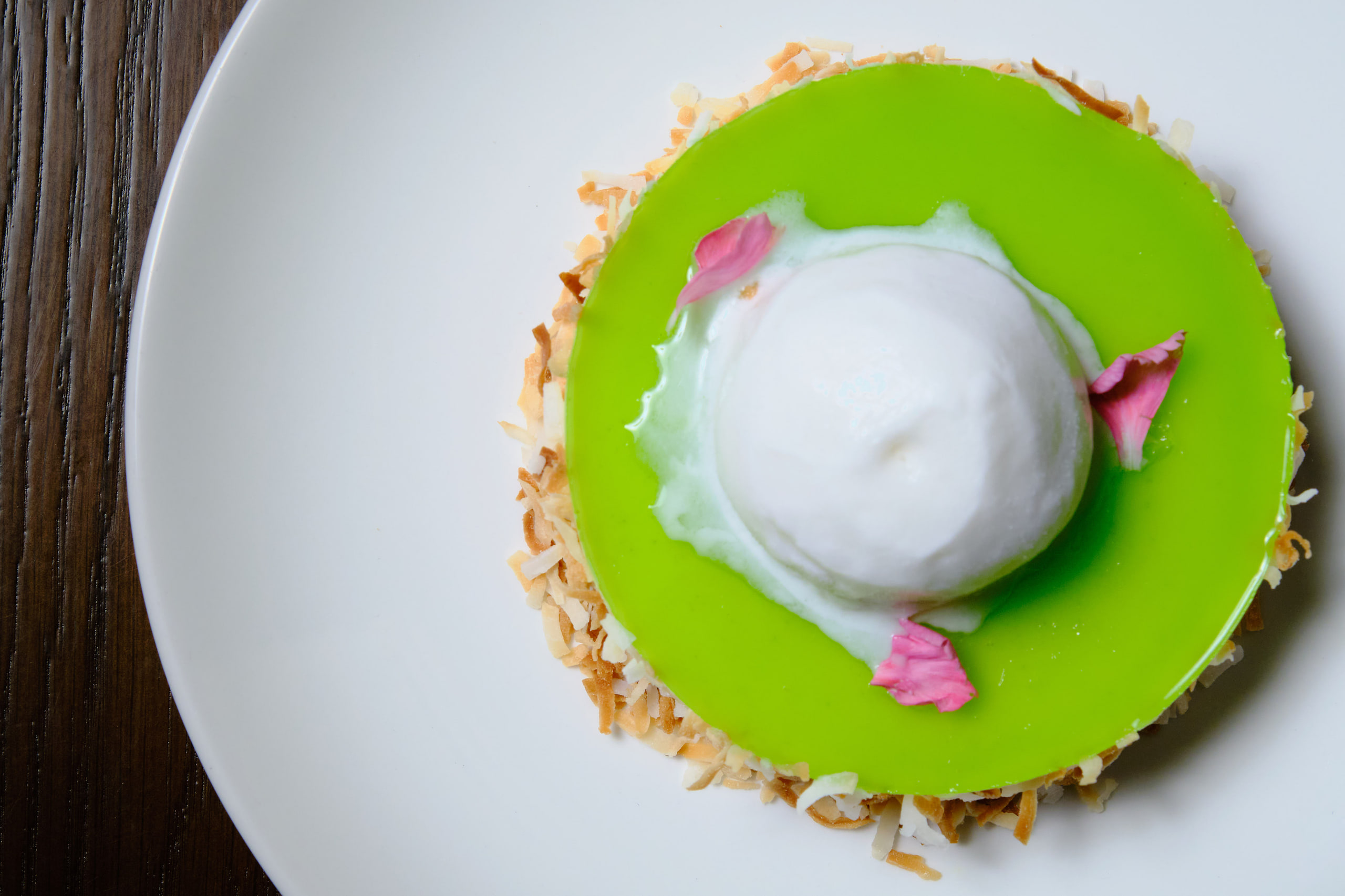 Green plate, white quenelle, bold and simple.