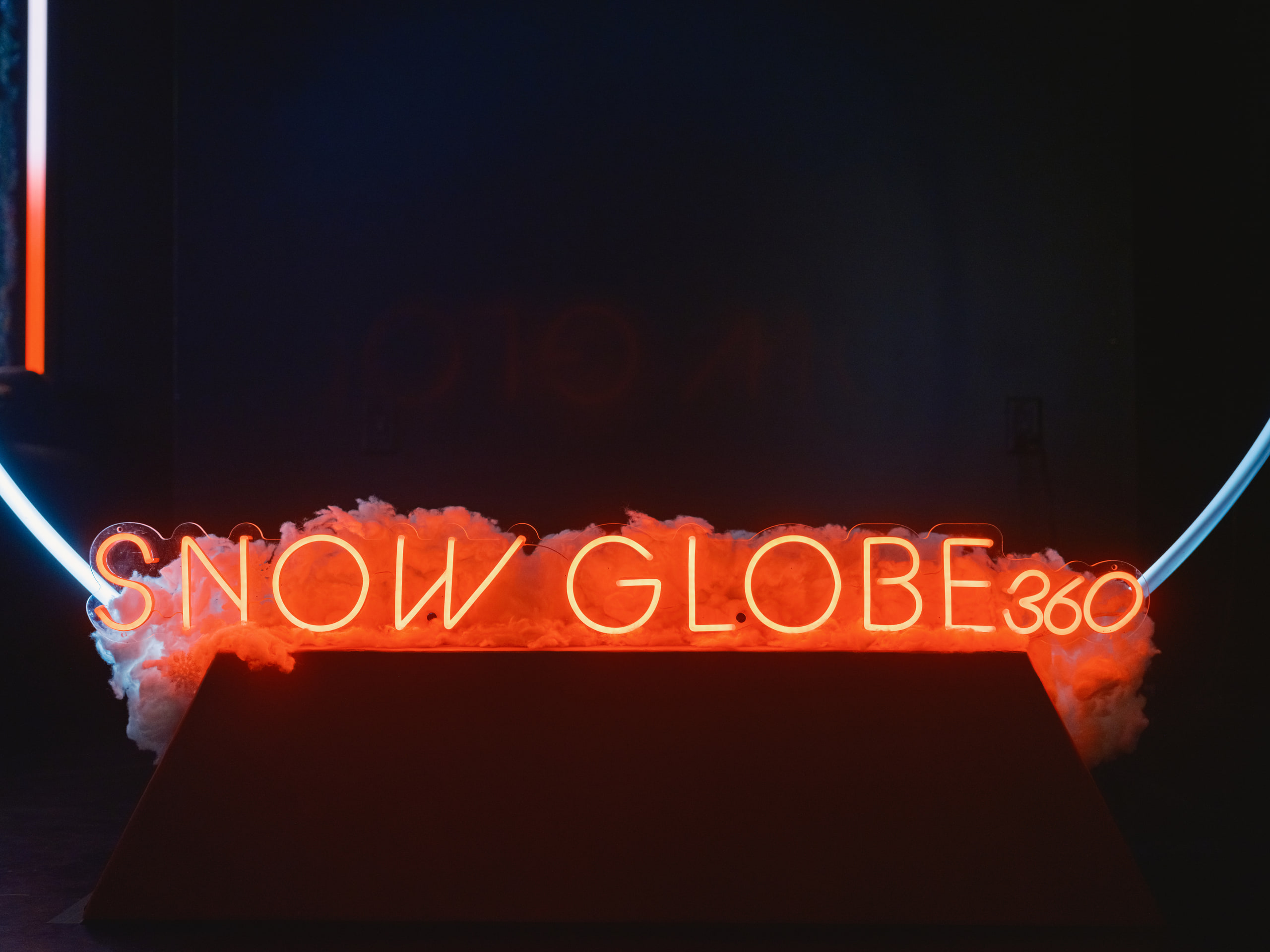 SNOW GLOBE in neon, sign as subject.
